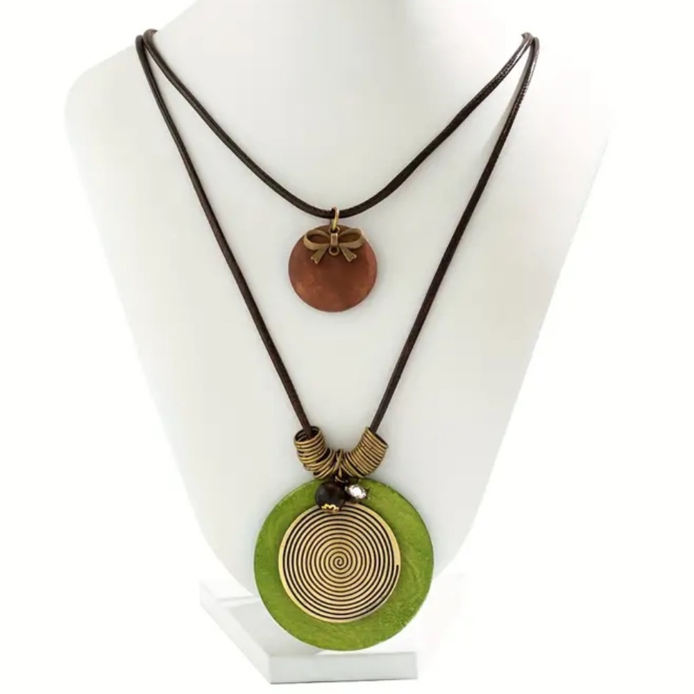 Necklace Wood disc charms,  hang off 2 brown cords 36” length + 2” extender. NIP